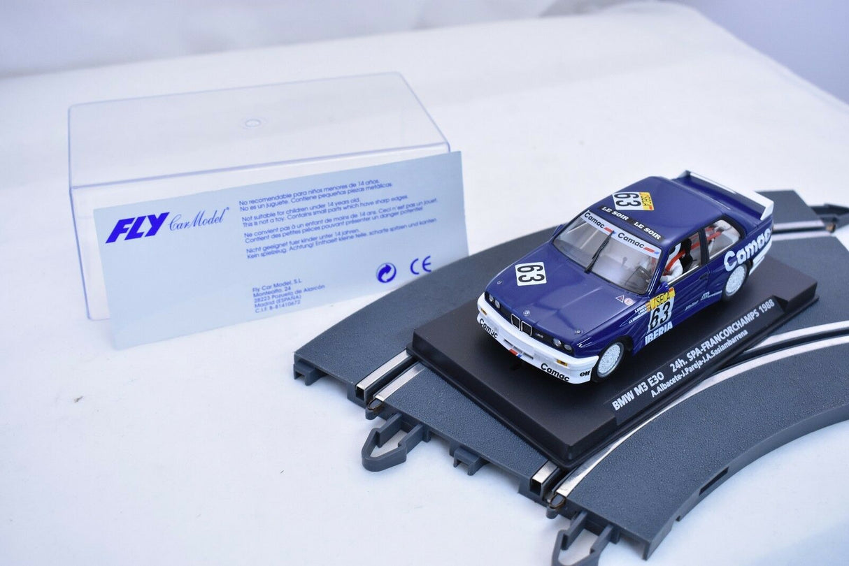 Slot car of a 1988 BMW M3 race car with accompanying card for FLY CAR 96092
