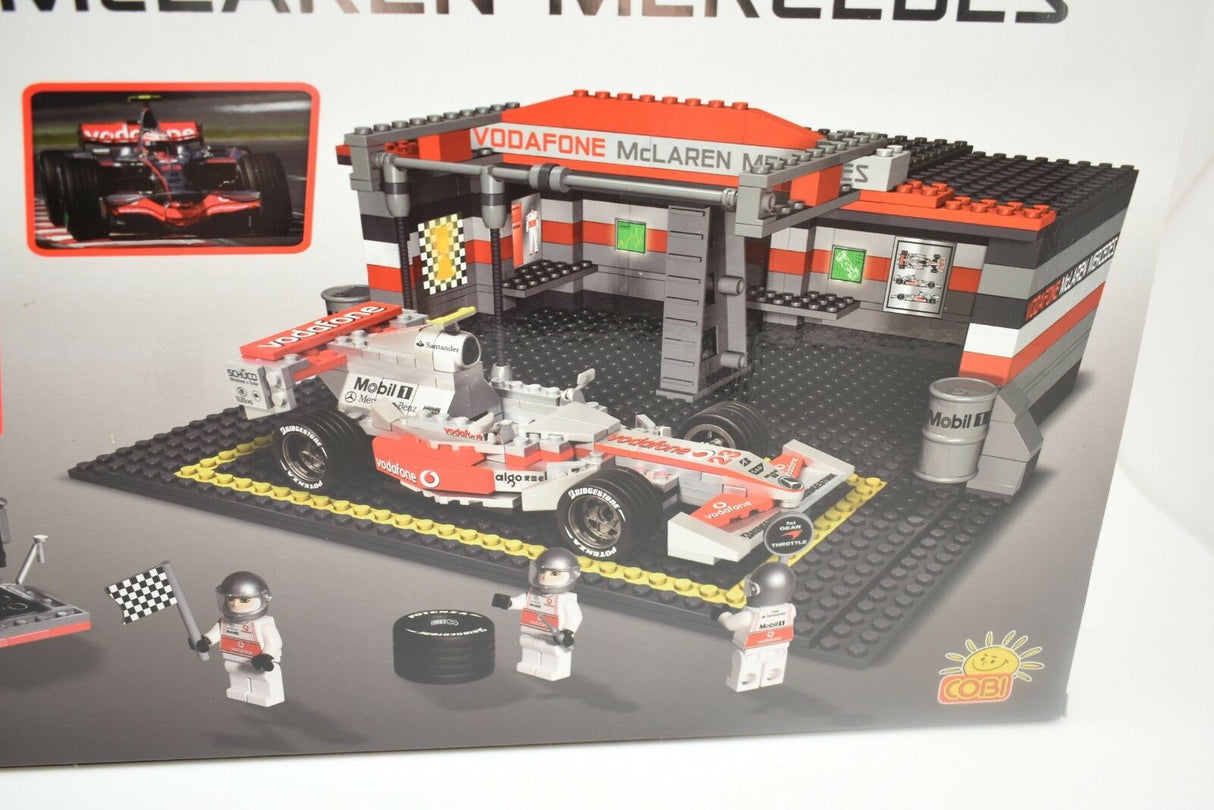 Race car building set with pit garage and minifigures for COBI COBI22550