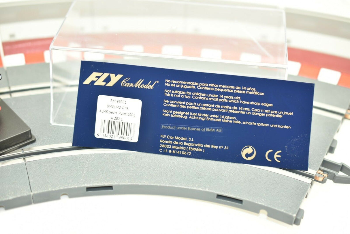Toy car packaging showing safety warnings and model details for Fly Car 99001