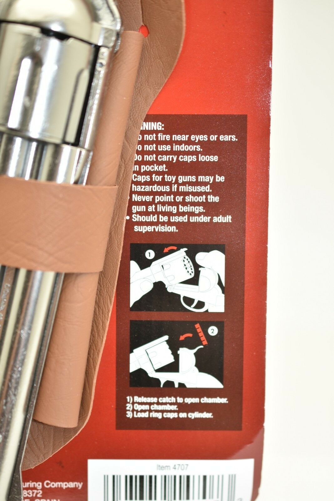 Instructions for loading caps into a toy pistol cylinder for Parris Toys 4707C