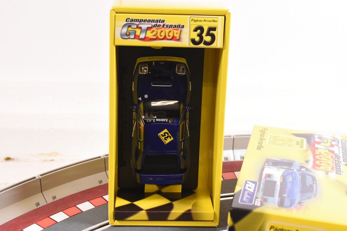 Slot car in yellow box, labeled "Campeonato de España GT 2001 35" for FLY CAR PA 6