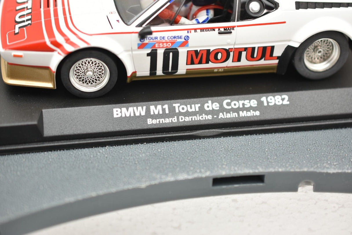 Model car of a 1982 BMW M1 race car, white with red and gold accents for Fly Car 88180