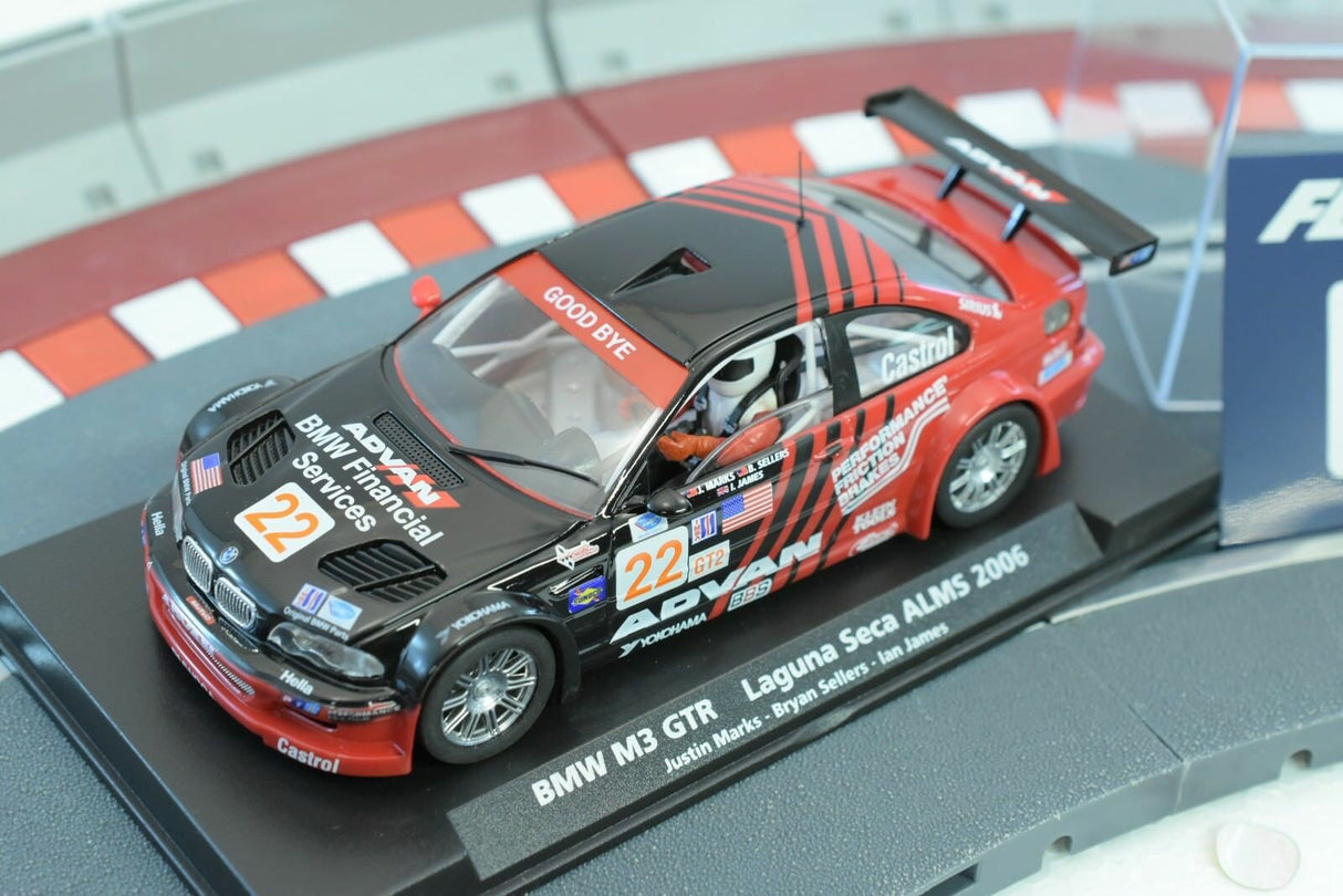 Slot car of 2006 BMW M3 GTR race car on a track display for Fly Car 88266