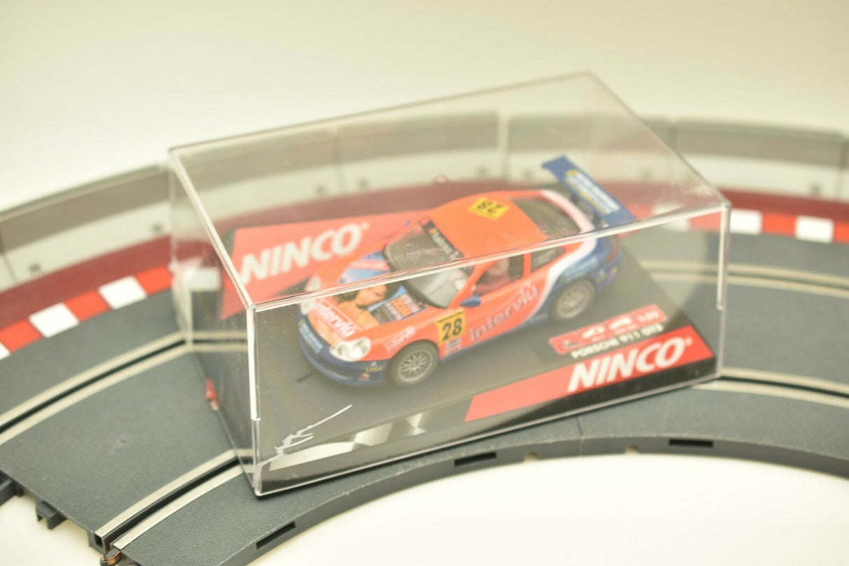 Slot car in clear case on track section for Ninco 50259