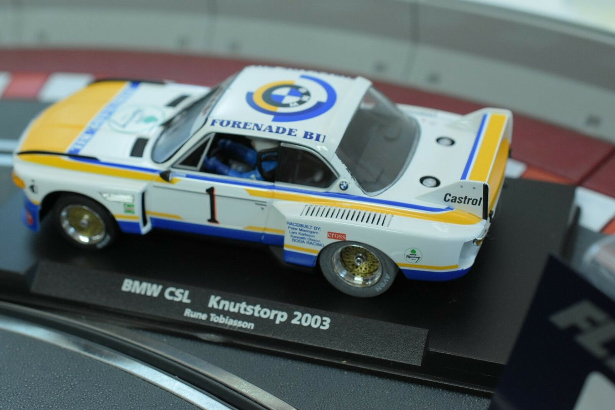 White and blue BMW CSL race car model on a track for Fly Car 88177