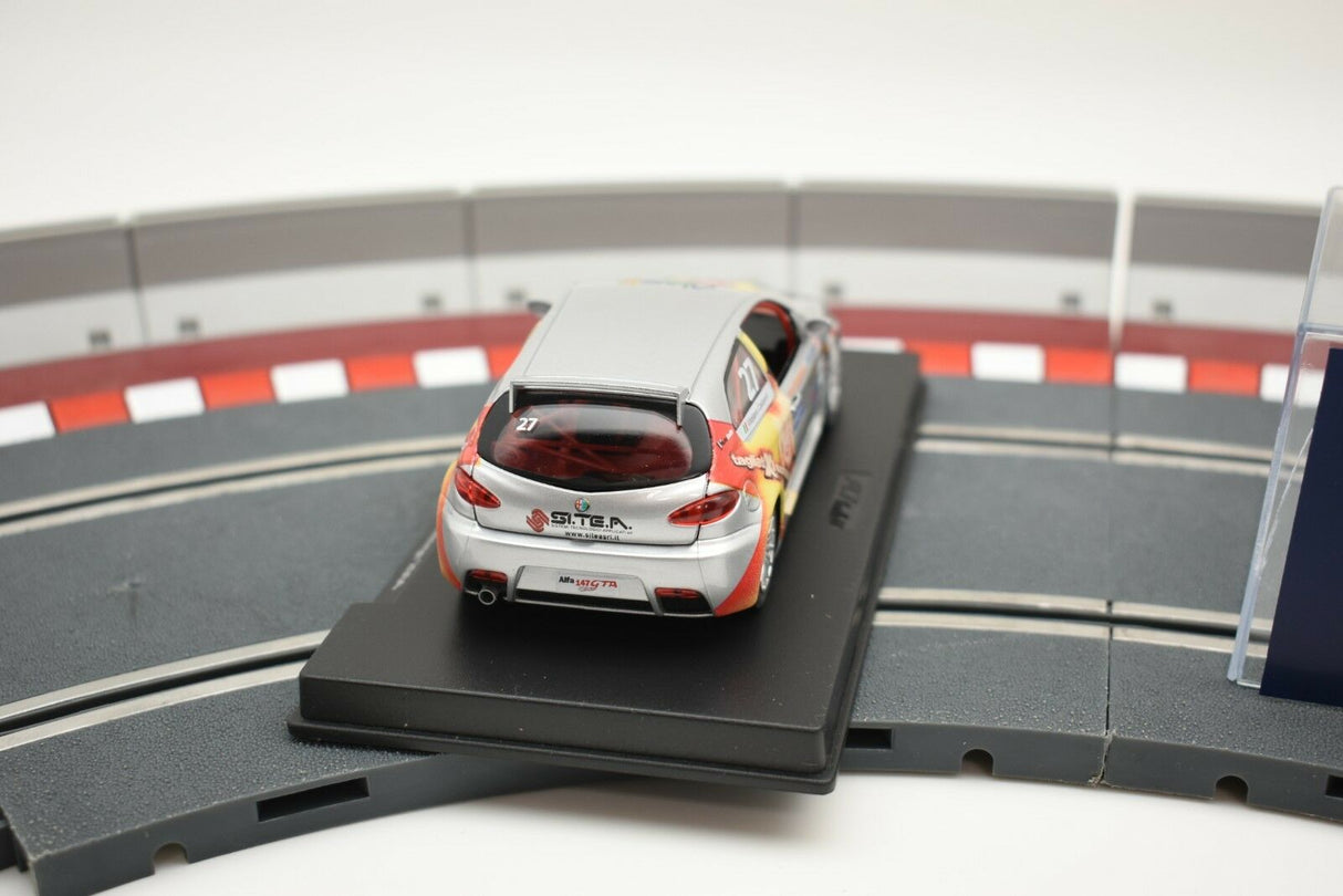 Red and white Alfa 147 GTA race car on a track section for Fly Car 88259