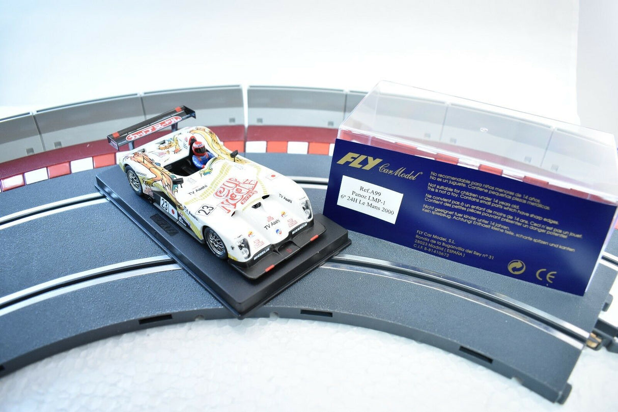 Race car model on track section with packaging for Fly Car A99