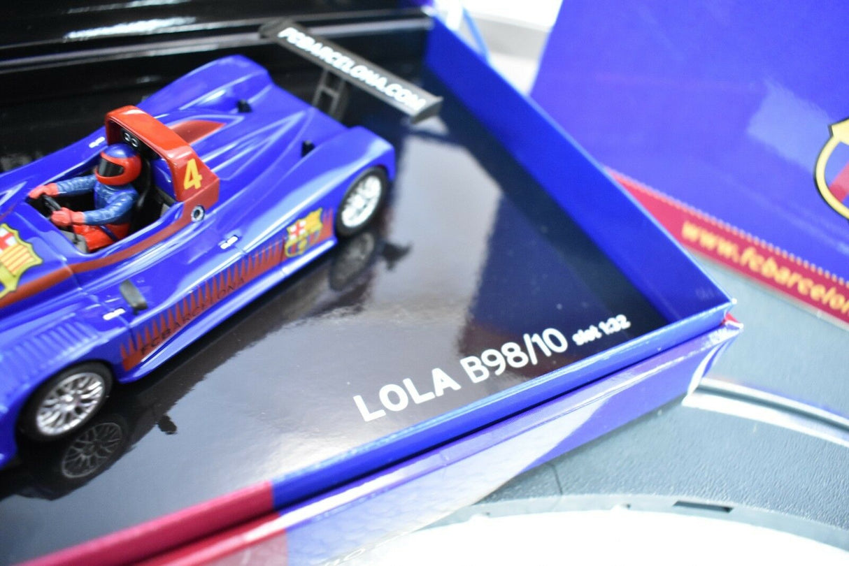 Blue and red race car model, Lola B98/10, displayed in its box for Fly Car 96013