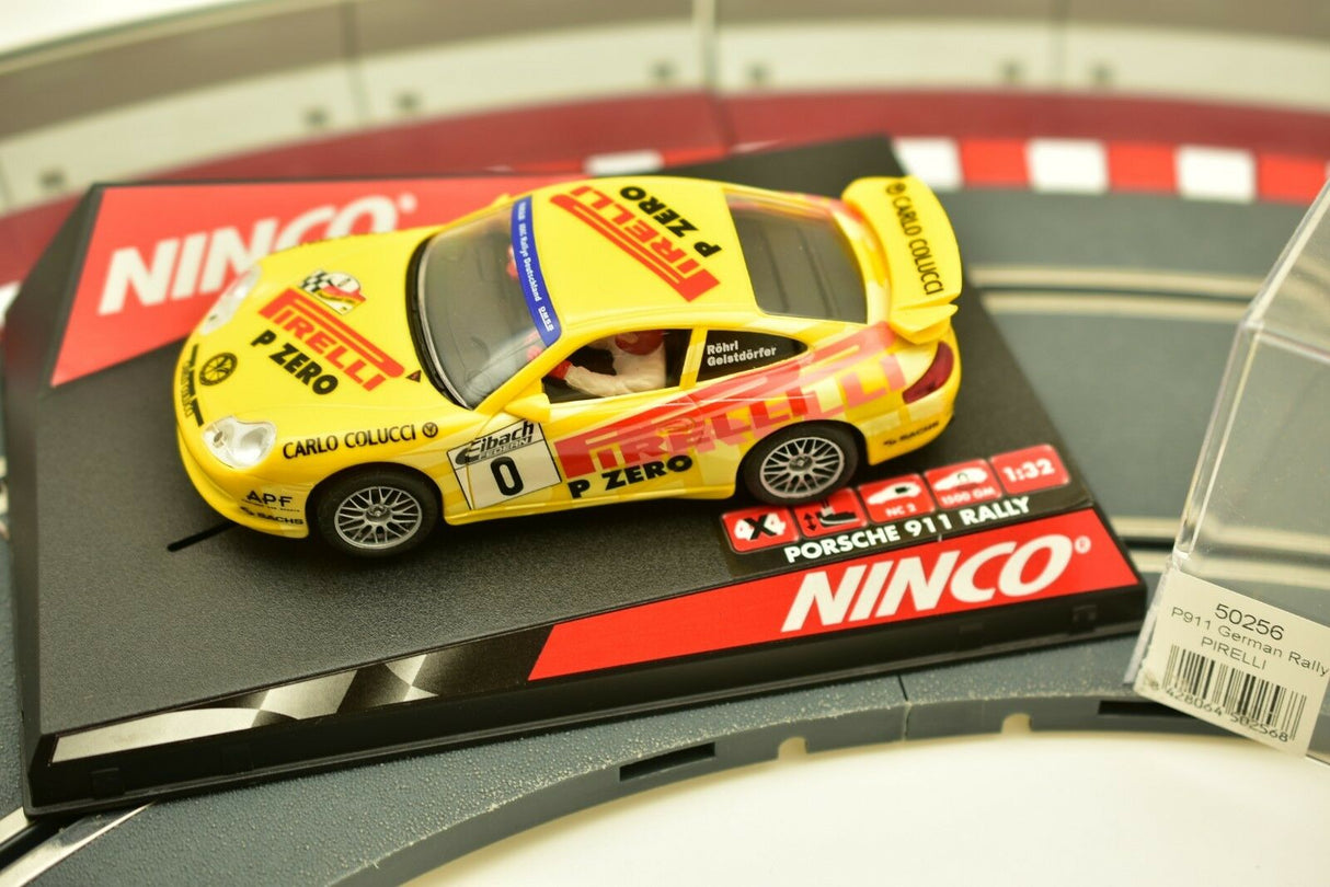 Yellow slot car of a Porsche 911 German Rally car for Ninco 50256