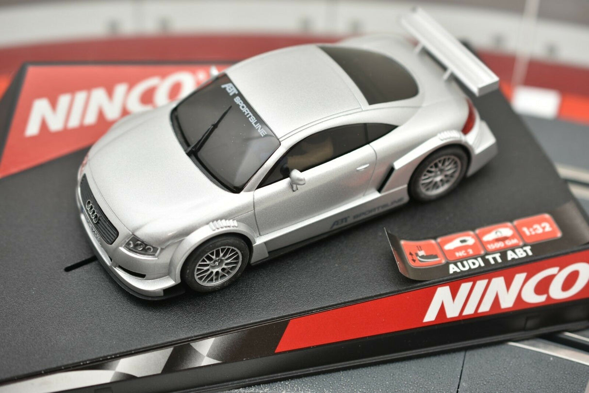 Silver slot car of an Audi TT-ABT on a track base for Ninco 50252