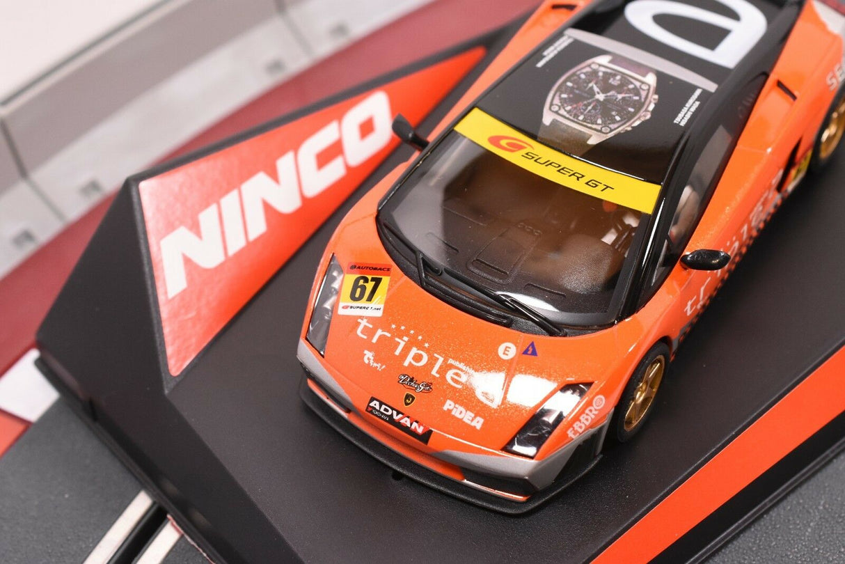 Orange Lamborghini Gallardo slot car on a track section for ZZ Expired Kim Collection 50513
