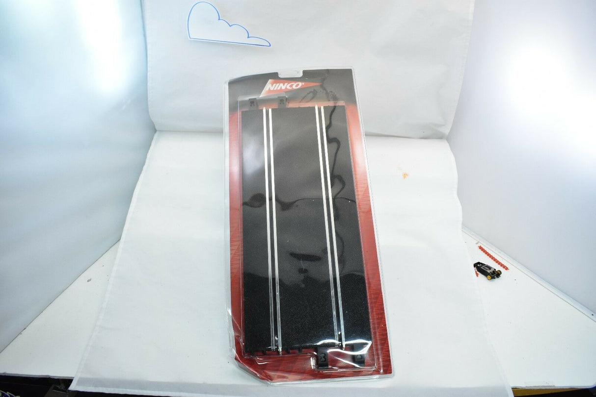 Straight track piece for model train set, packaged in clear plastic for Ninco 10102