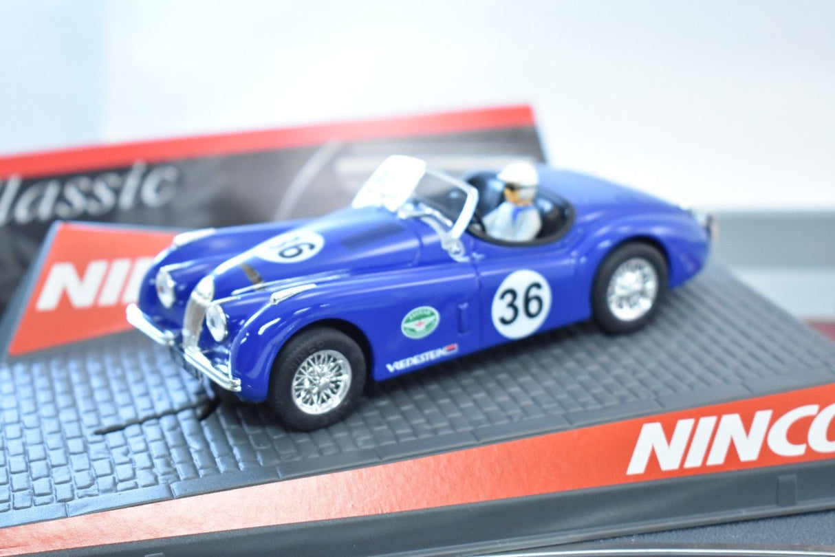 Blue 1/32 scale slot car racer with number 36 on a track for ZZ Expired Kim Collection 50520