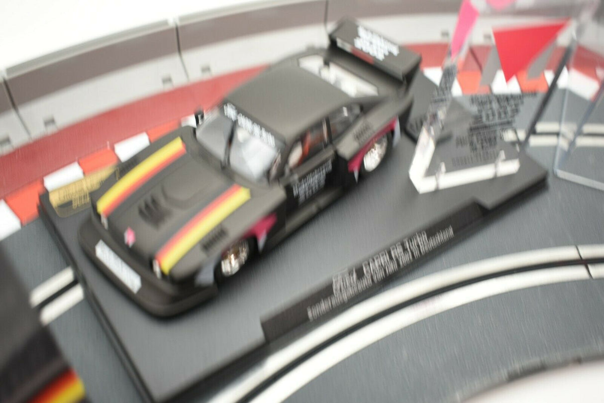 Slot car of a Ford Capri RS Turbo race car on a track for Fly Car 96008