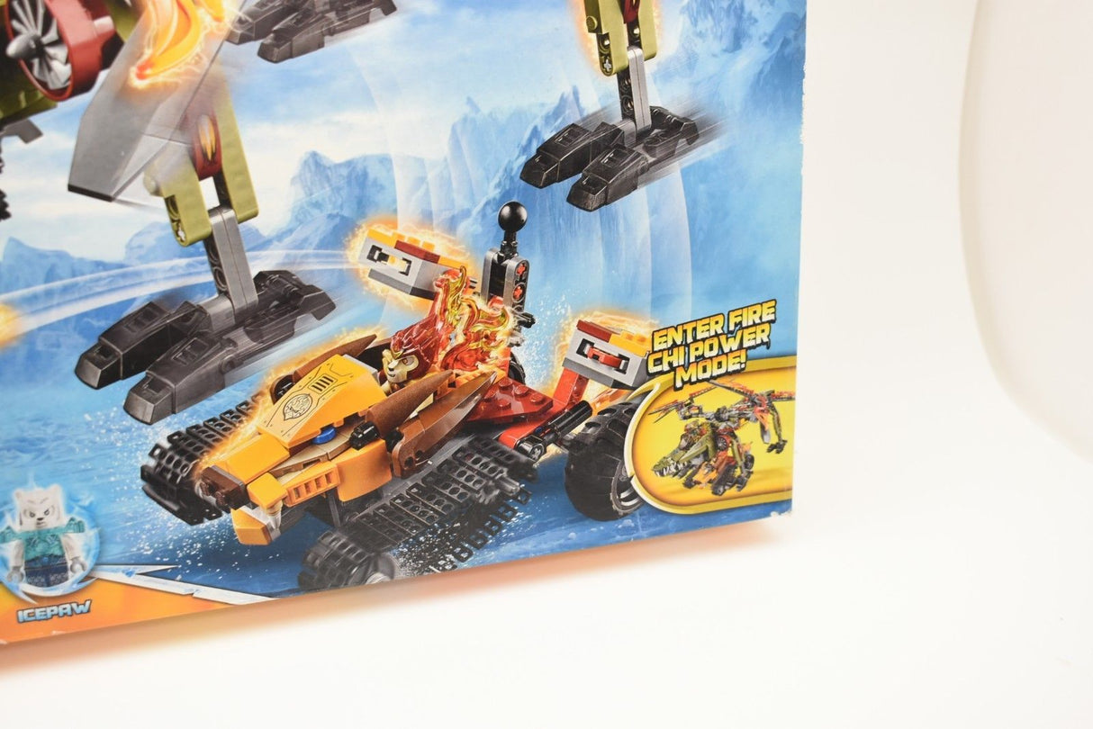 Action scene with vehicles and characters in a snowy, mountainous setting for Lego LEGO