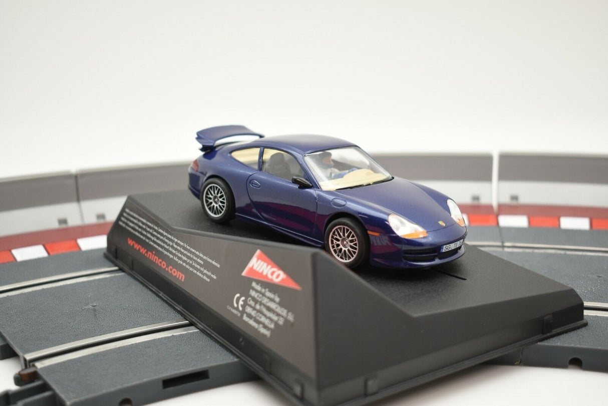 Blue Porsche GT3 model car on a track section for NINCO 50234