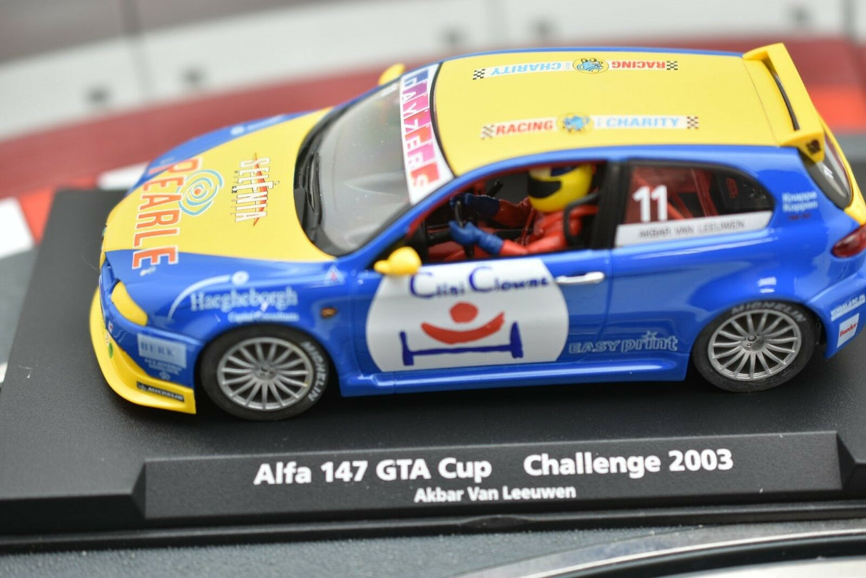 Slot car of a yellow and blue Alfa 147 race car from 2003 for Fly Car 88143