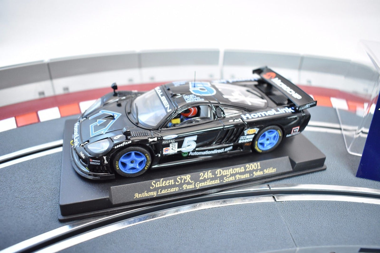 Slot car of a 2001 Saleen S7R race car on a display base for Fly Car 88015, front view