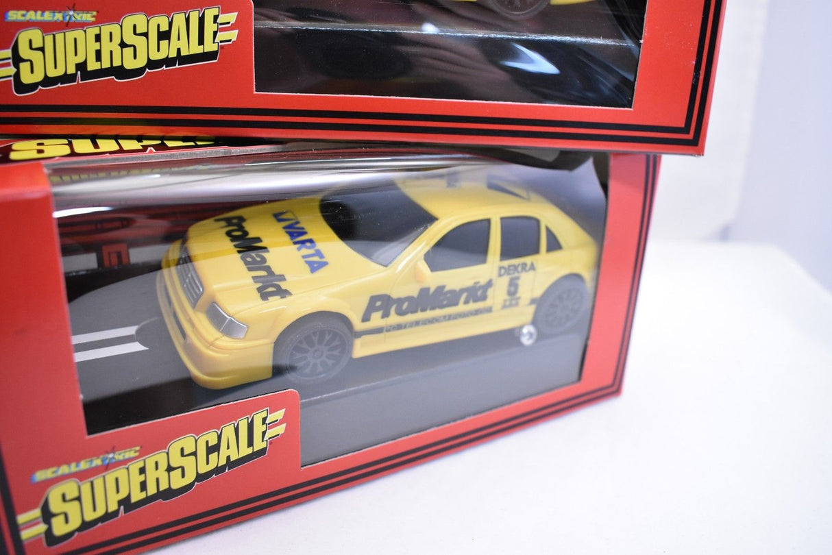 Yellow scale model car in a red box for Superscale Scalextric 699
