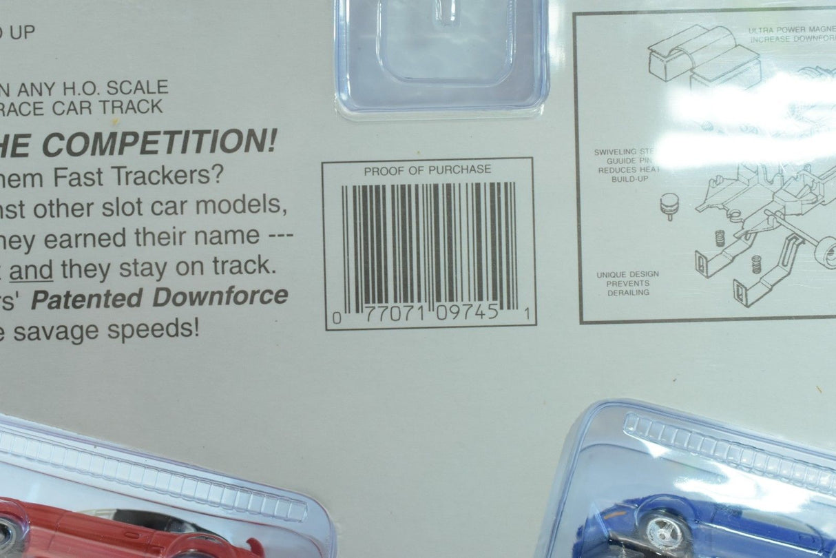 Racing cars displayed in clear plastic packaging for Life-Like Racing Max-Traxx 9745