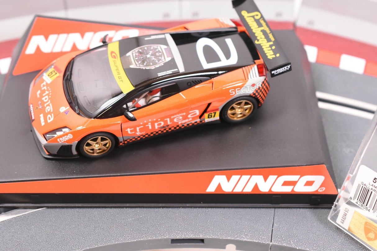 Orange Lamborghini Gallardo slot car on a black base for ZZ Expired Kim Collection 50513