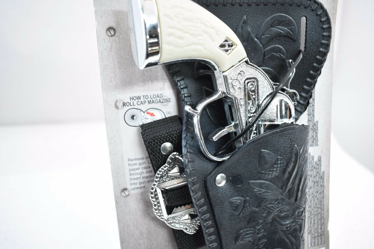 Pistol holstered in black leather with loading instructions visible for Parris Toys 5502