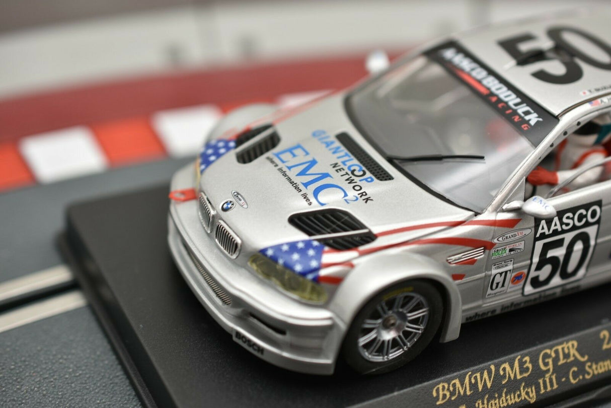 Scale model of a BMW M3 GTR race car on a black base for Fly Car 88009