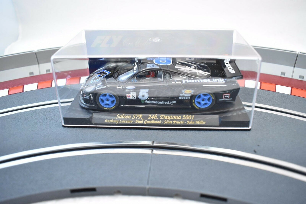 Slot car of a 2001 Saleen S7R race car on a display stand for Fly Car 88015