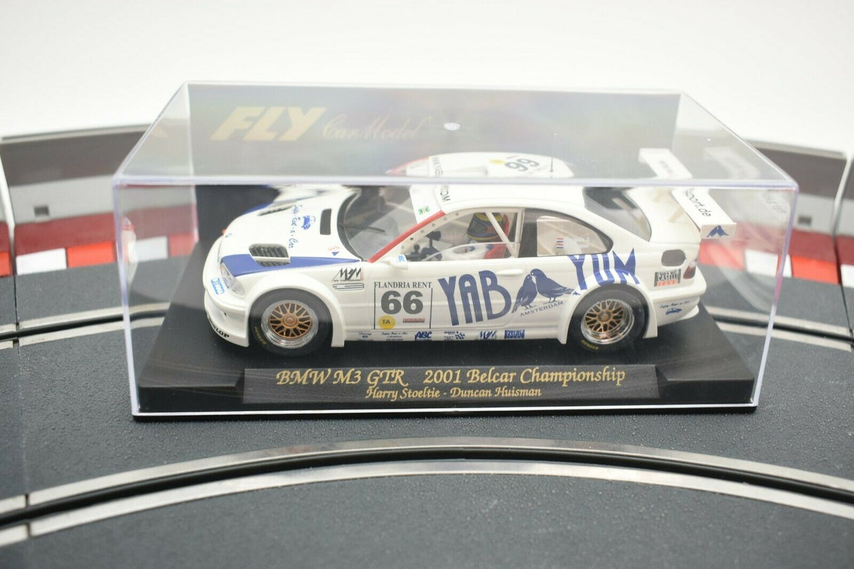 Slot car of a 2001 BMW M3 GTR race car in a clear display case for Fly Car 88013