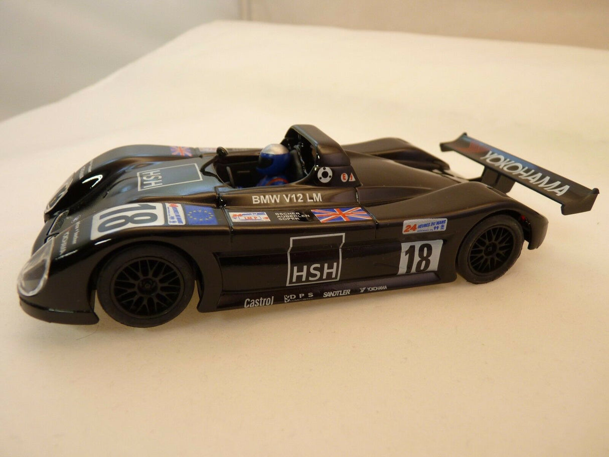 Black BMW V12 race car model with "HSH" and "YOKOHAMA" decals for Ninco 50213