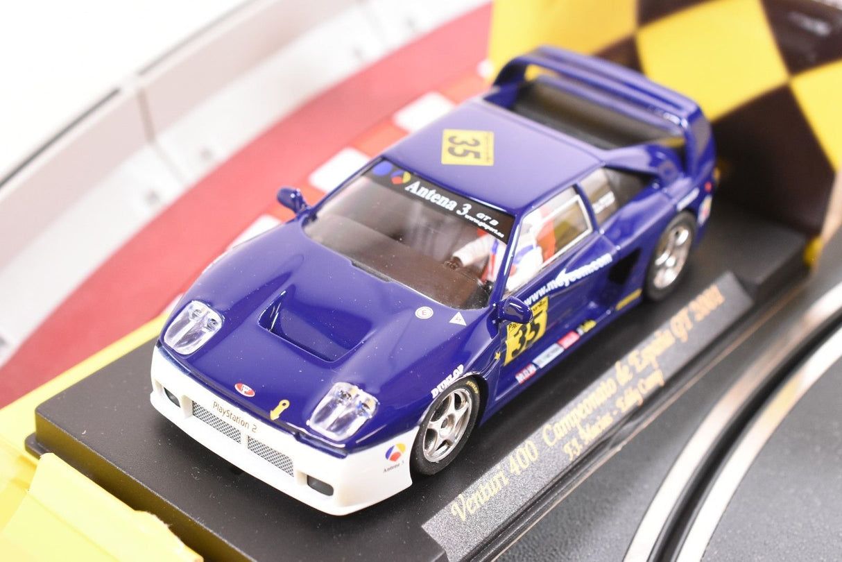 Blue race car model on a track diorama for FLY CAR PA 6
