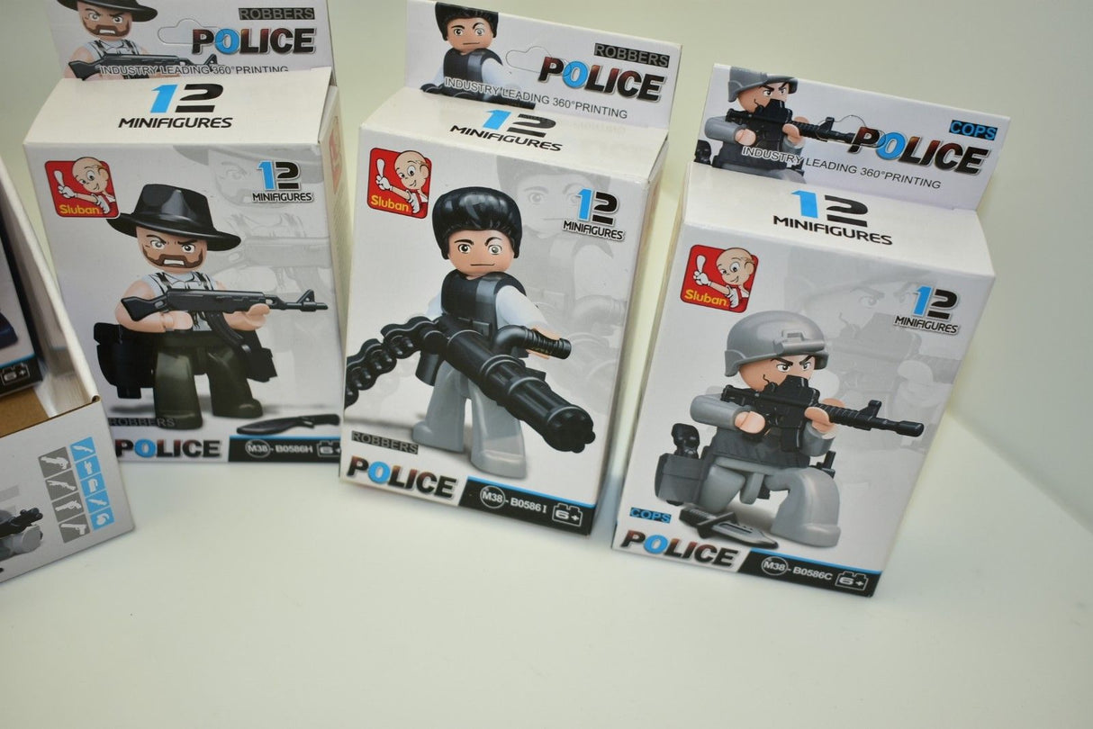 Three boxes of police and robber minifigures for building sets for Sluban M38-B0586