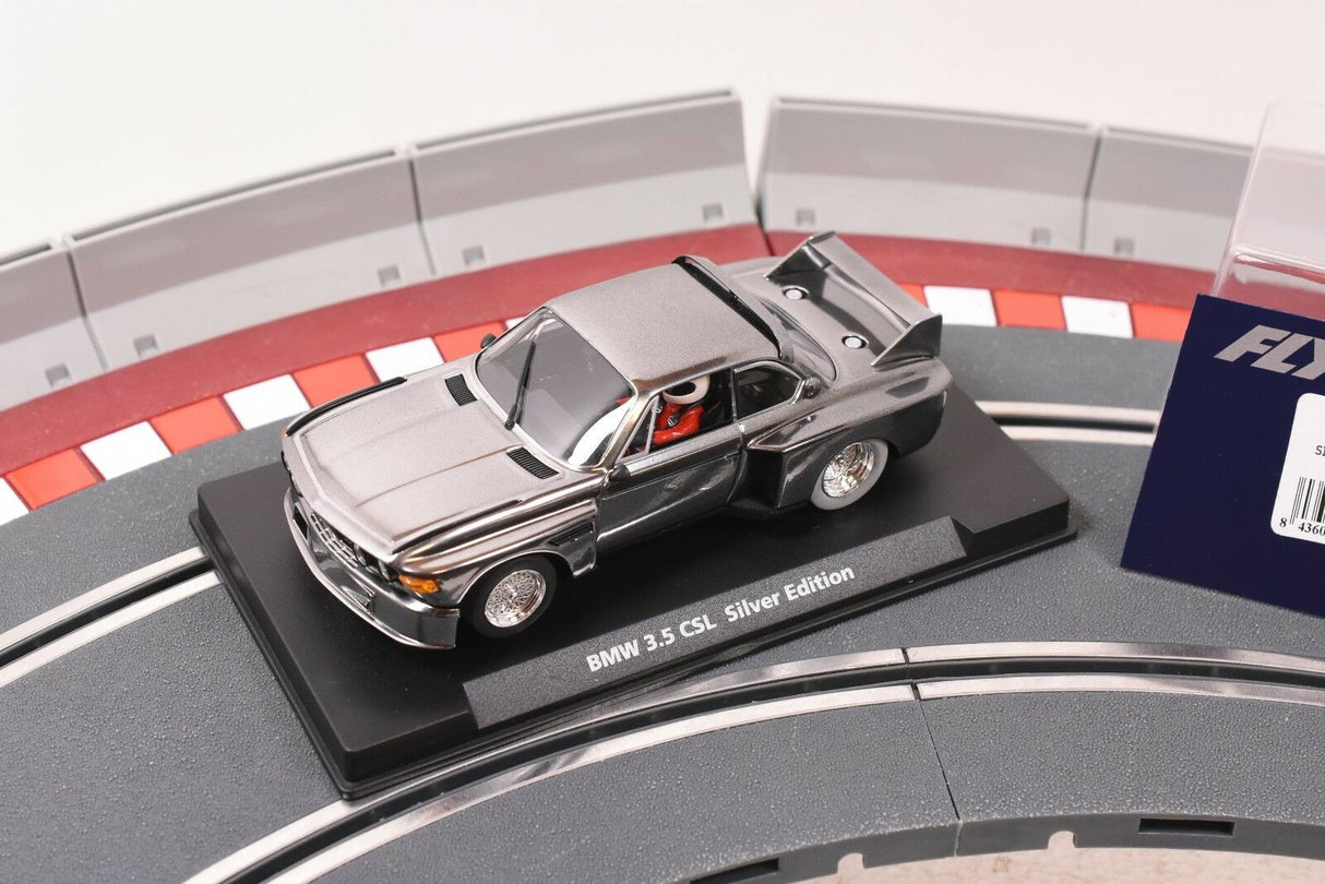 Silver model car of the BMW 3.5 CSL Silver Edition on a display base for Fly Car 88124