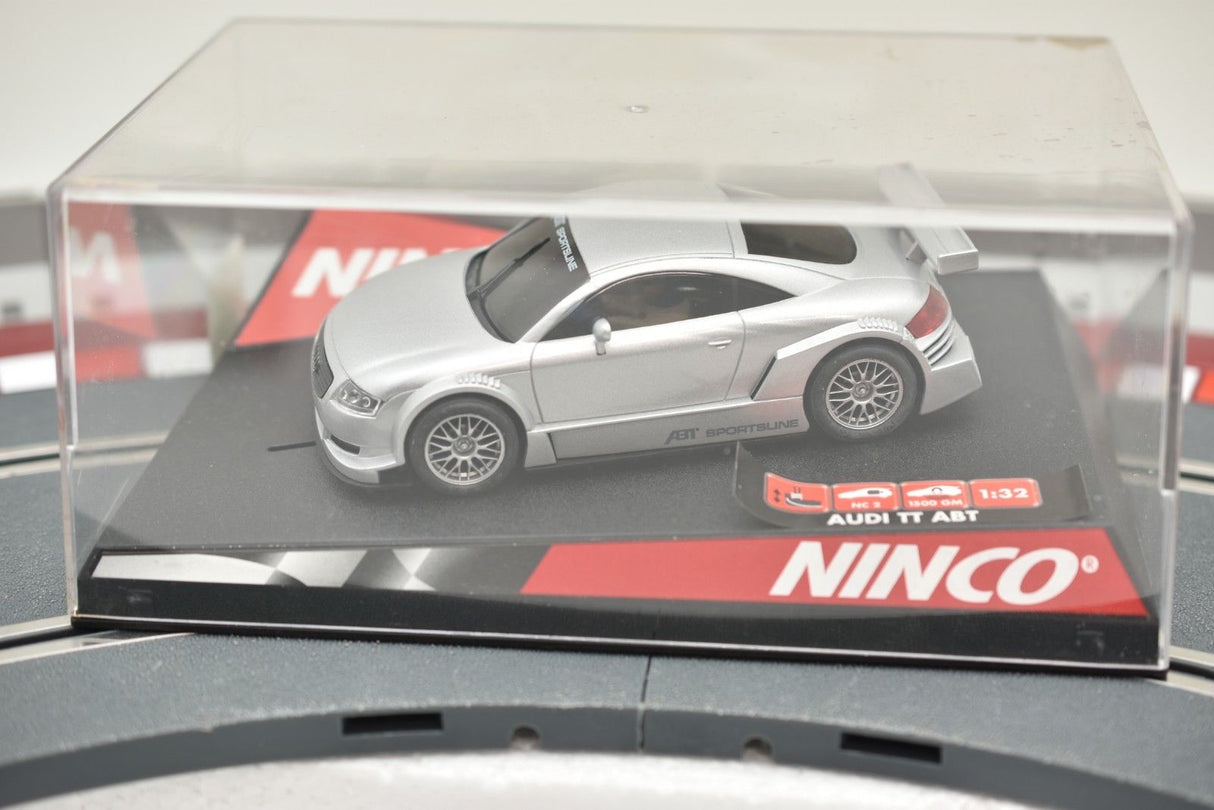 Silver Audi TT model car in clear display case for Ninco 50252