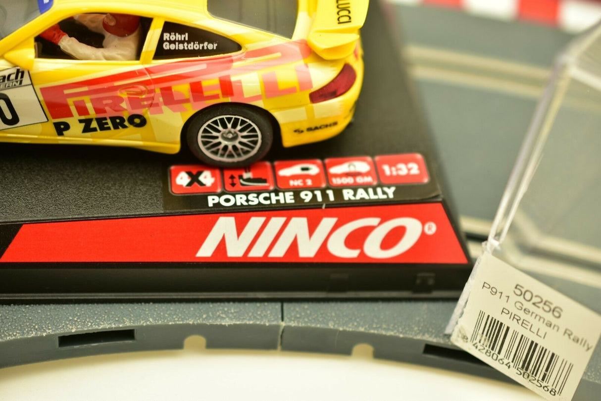 Yellow Porsche 911 race car toy with "Pirelli" branding for Ninco 50256