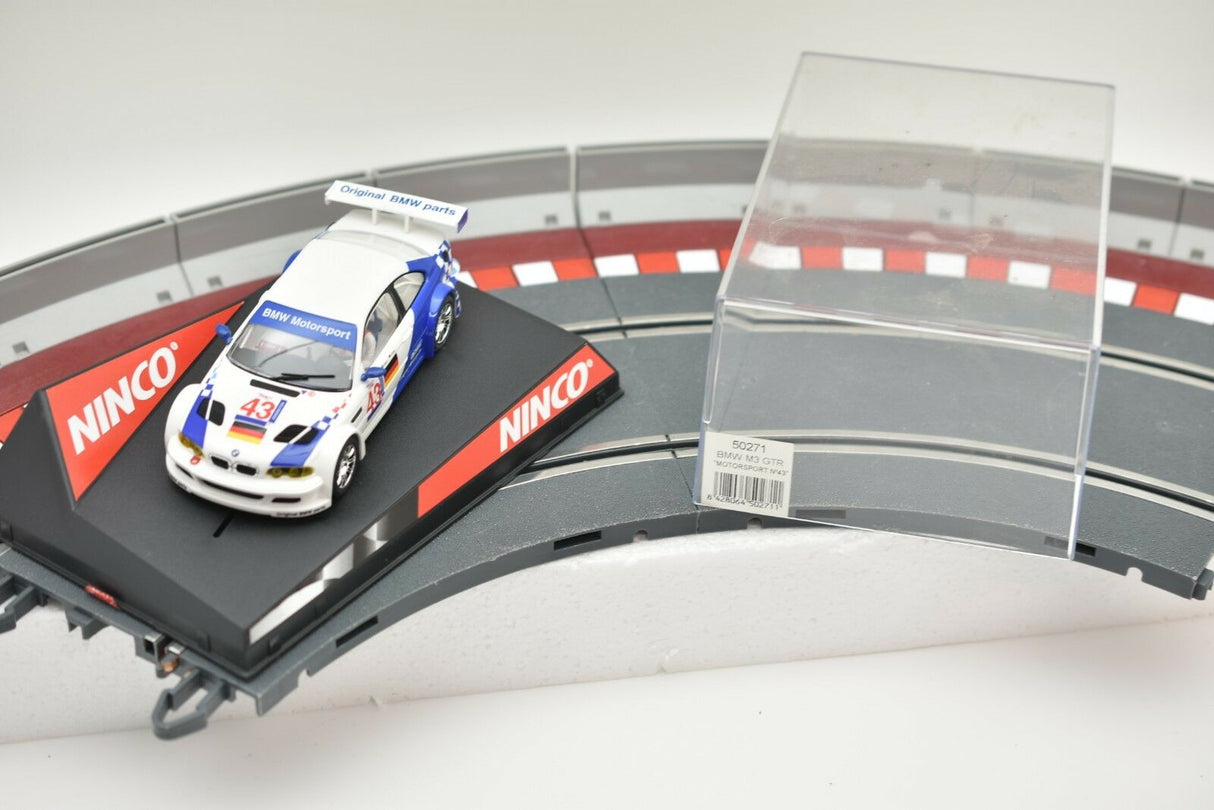 BMW M3 GTR slot car on a track section for REH Ninco 50271
