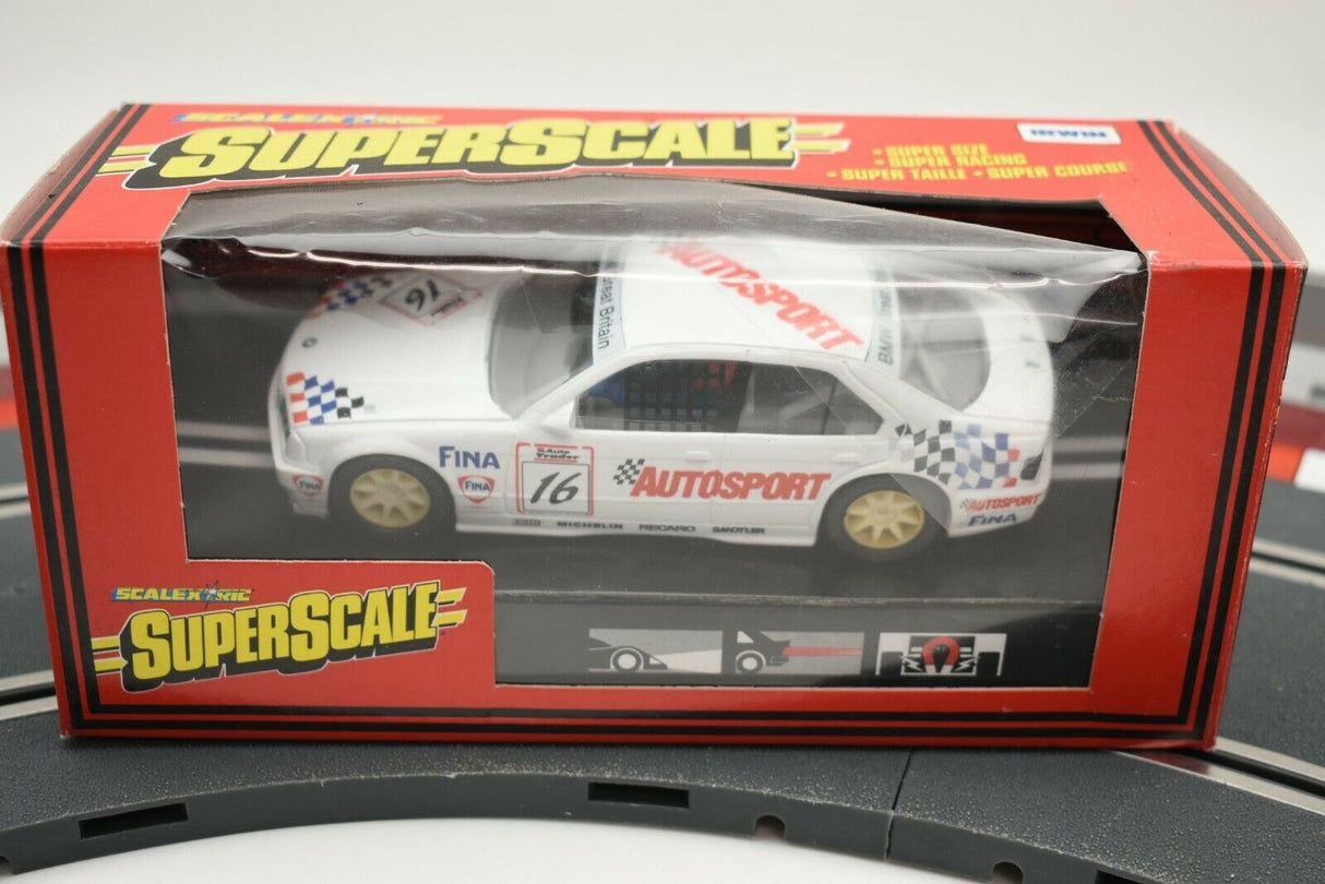 White BMW race car in box, showing Autosport branding for Scalextric C.571