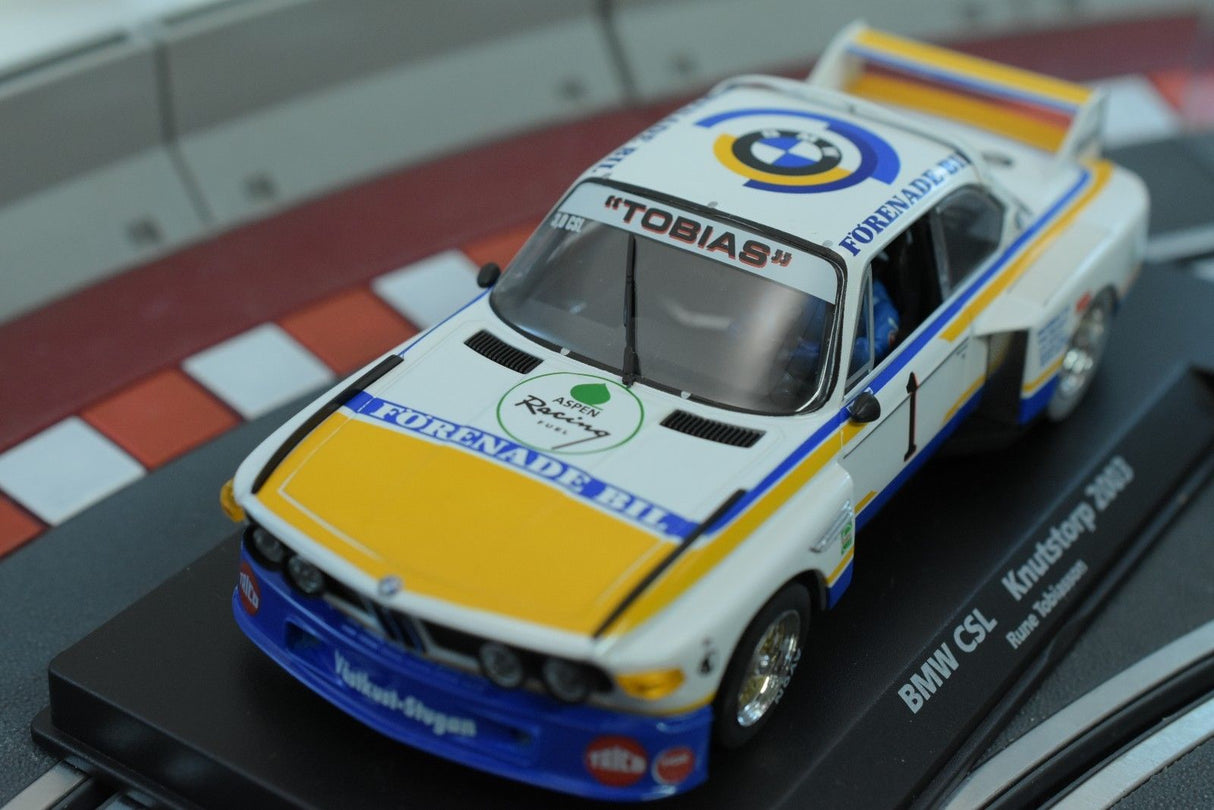 Yellow and white BMW race car model on a track section for Fly Car 88177, alternate track view