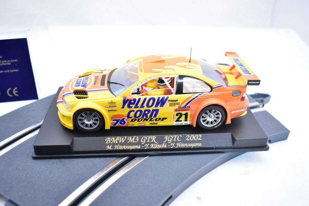 Yellow BMW M3 GTR race car model on a display base for Fly Car 88017
