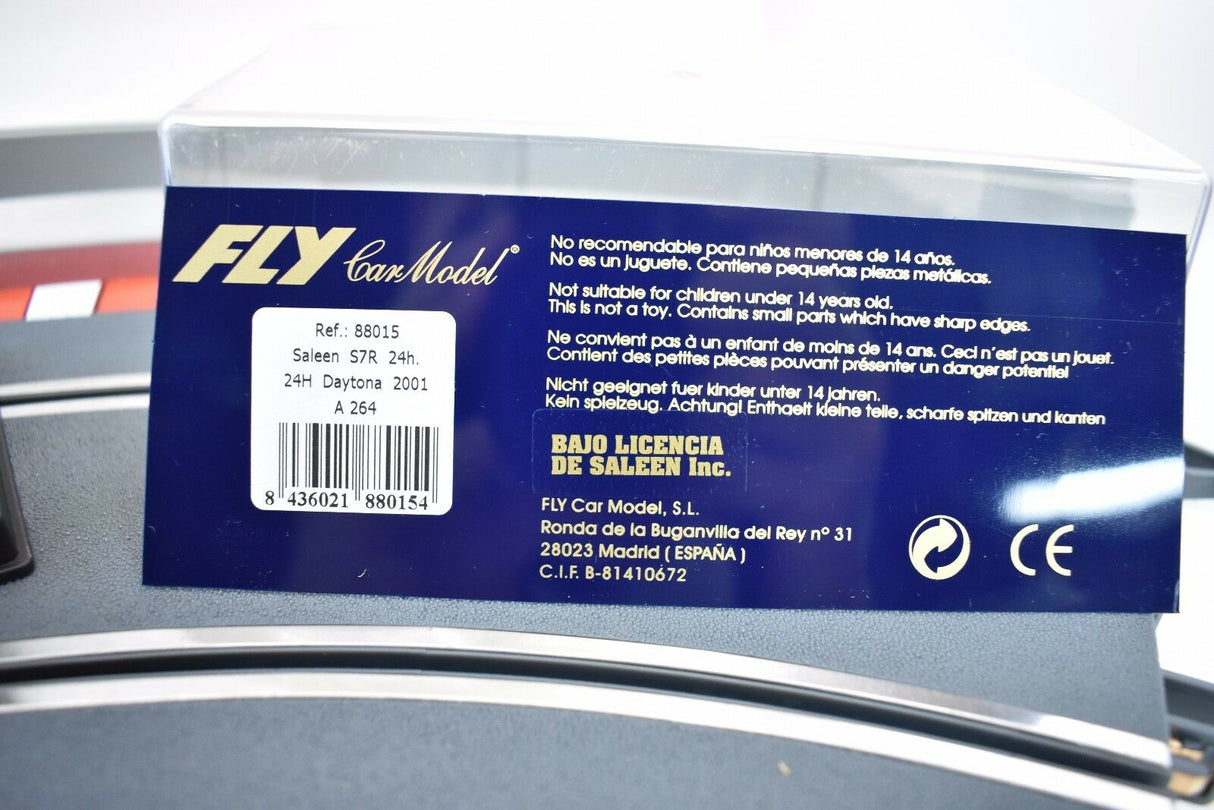 Product packaging showing safety warnings and model details for a slot car for Fly Car 88015