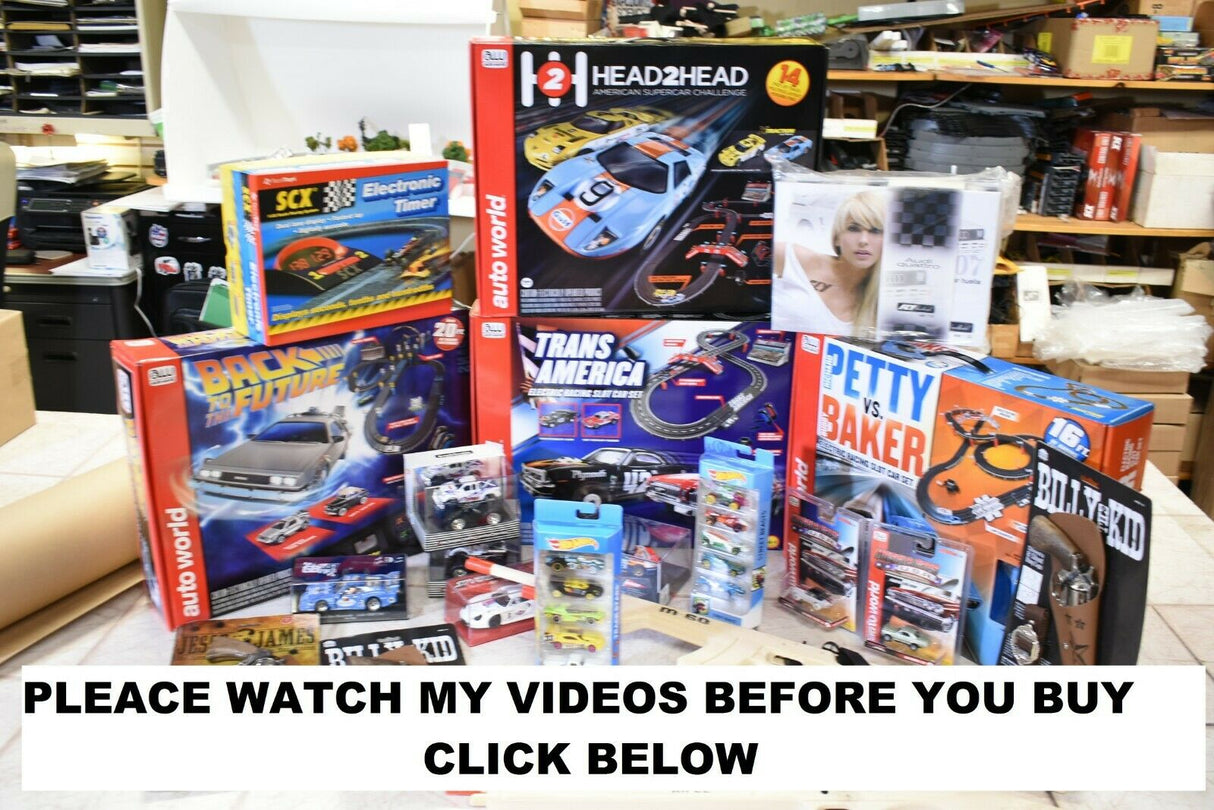 Renault Megane Trophy race car model displayed with various car toys for SCX A10151X3U0