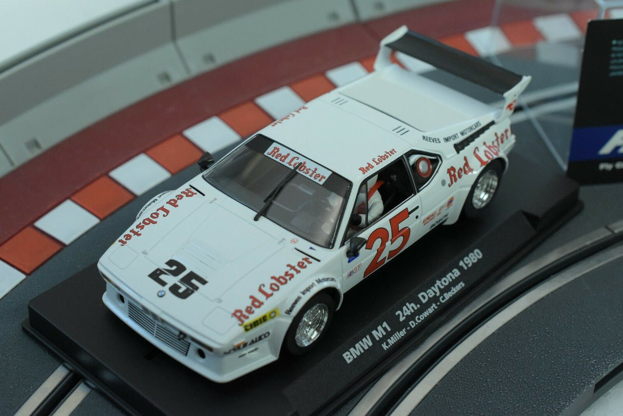 Slot car of a 1980 BMW M1 race car on a display base for Fly Car 88315