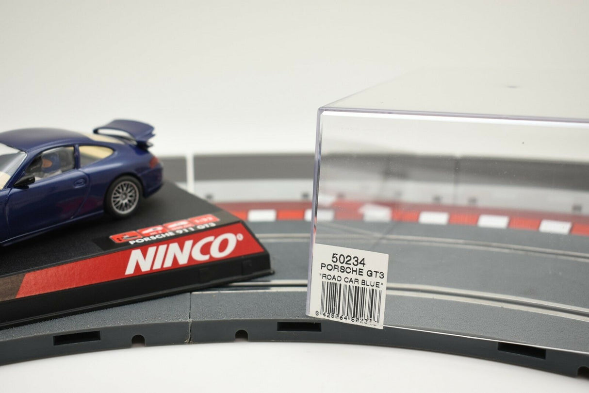 Blue Porsche GT3 car next to a product box with model number 50234 for NINCO