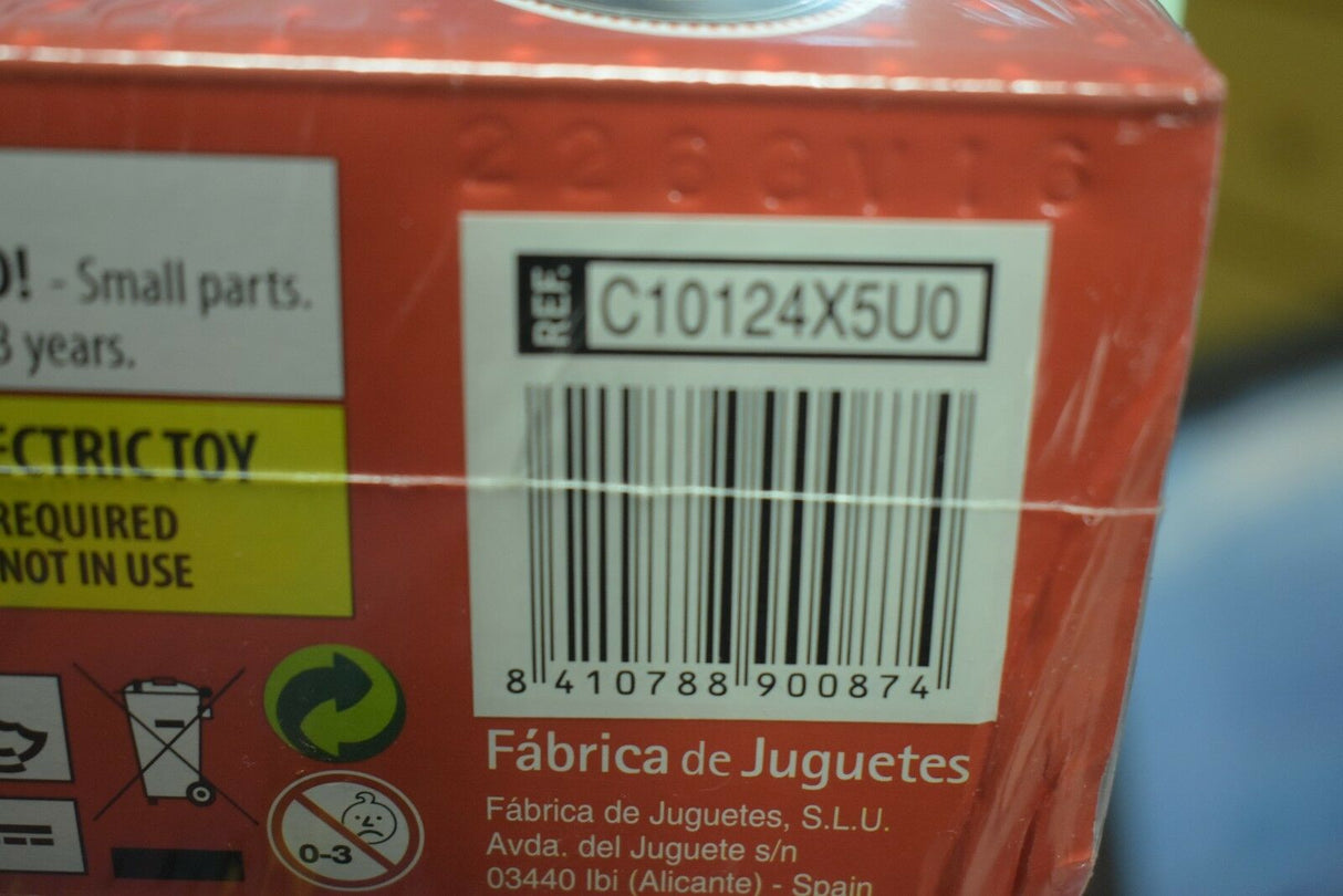 Product label showing model number C10125X5U0 and safety warnings for SCX Compact