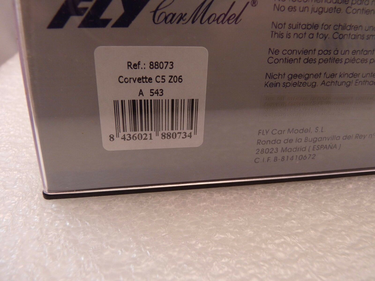 Product box for Corvette C5 Z06 model car, showing model details and barcode for Fly Car 88073