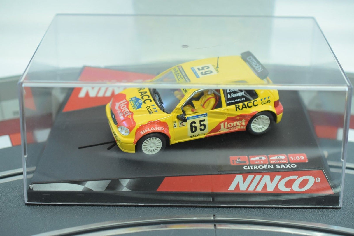 Yellow 1:32 scale model of a Citroen Saxo race car for Ninco 50266