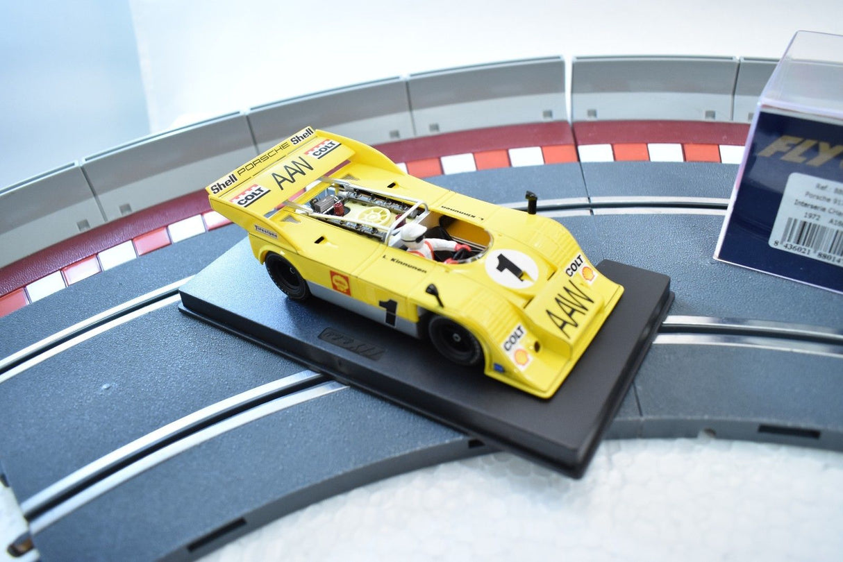 Yellow race car model on a track section, representing a 1972 Porsche for Fly Car 88014