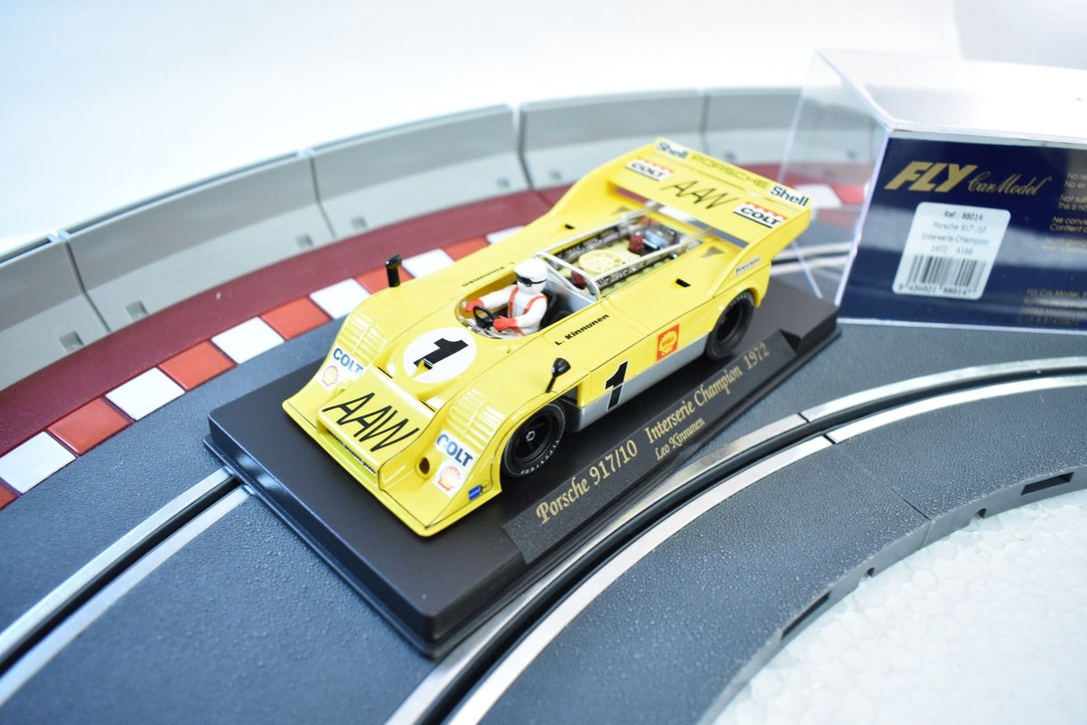 Yellow Porsche 917/10 race car model on a track section for Fly Car 88014