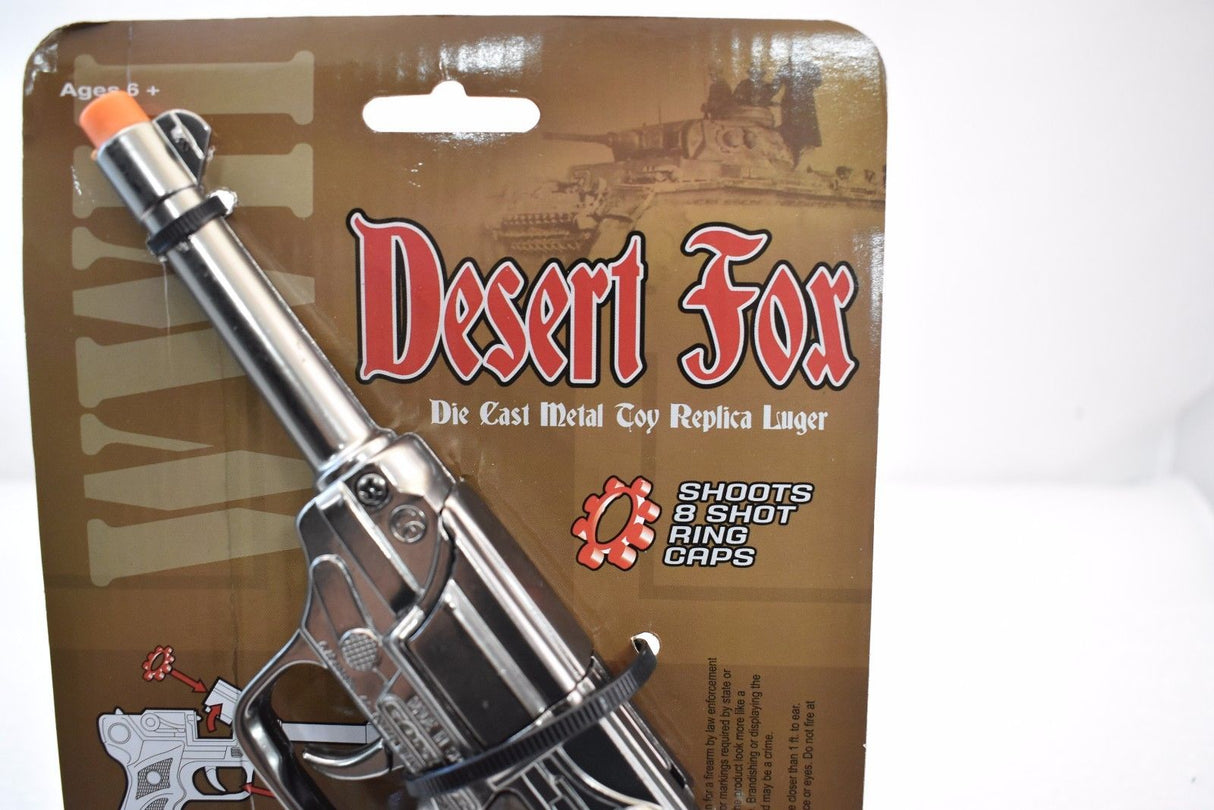 Toy replica luger gun in its packaging for Parris Replica 4641C