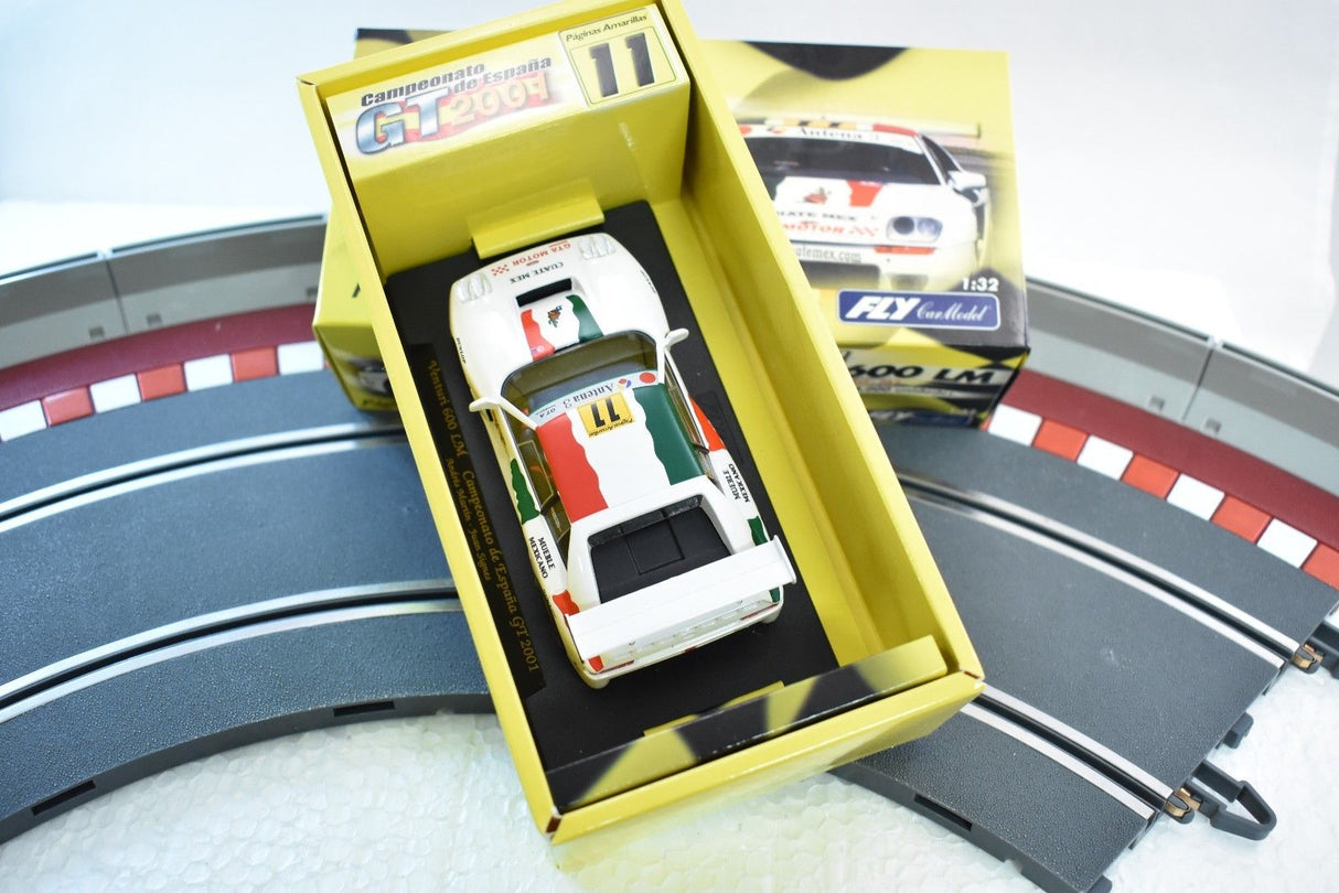 Slot car in open box on race track section for Fly Car PA2